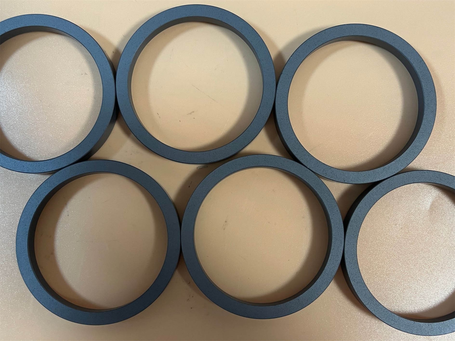 Porous graphite loaded sintered silicon carbide seal face