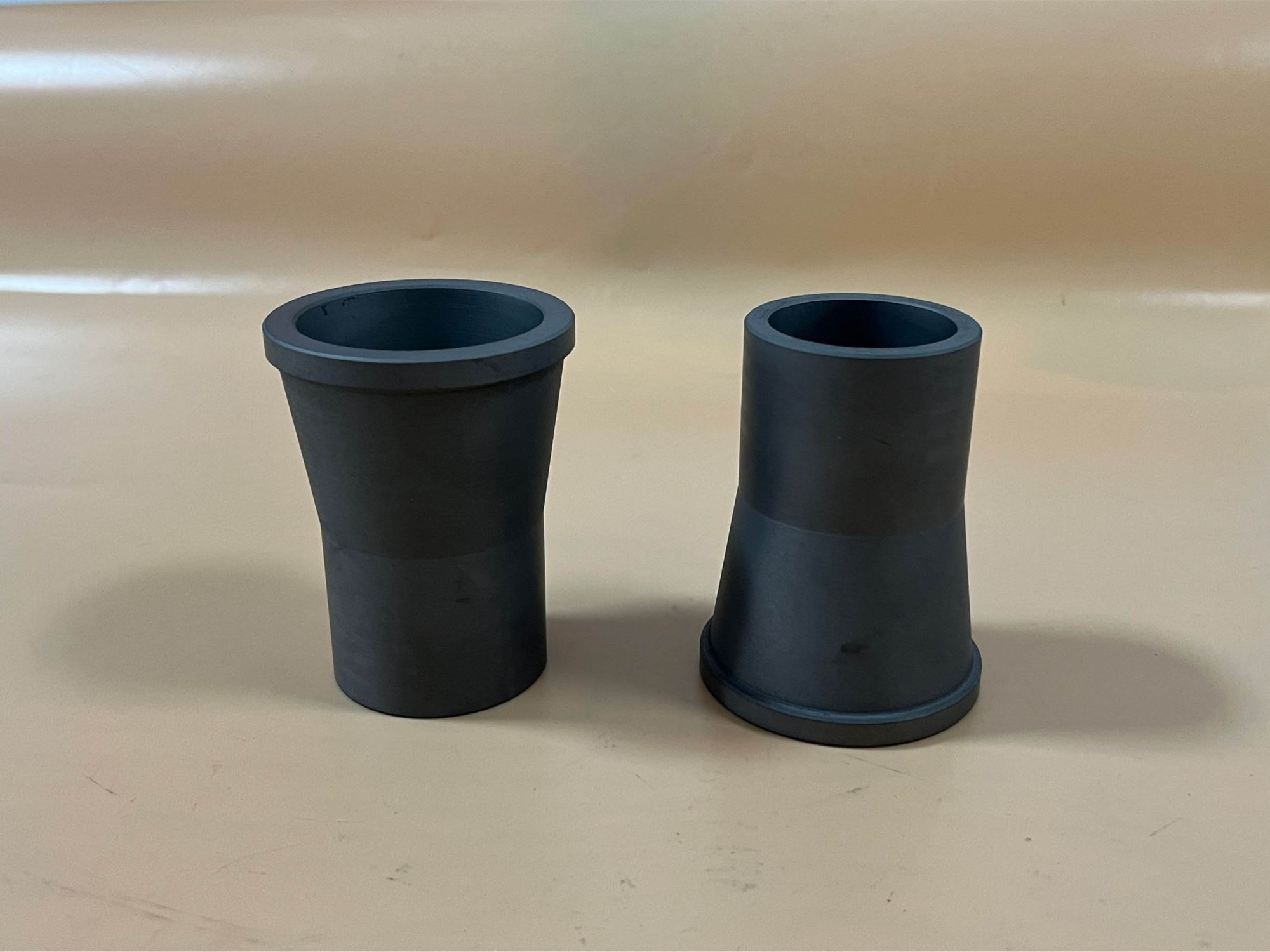 Wear and corrosion resistant ceramic reducer/nozzle/cyclone sleeve and tube in alpha sintered silicon carbide